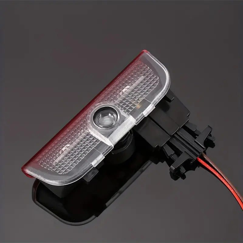 2 PROIETTORI LED LUCI SOTTOPORTA PER VOLKSWAGEN T-ROC CON LOGO PLUG AND PLAY CANBUS